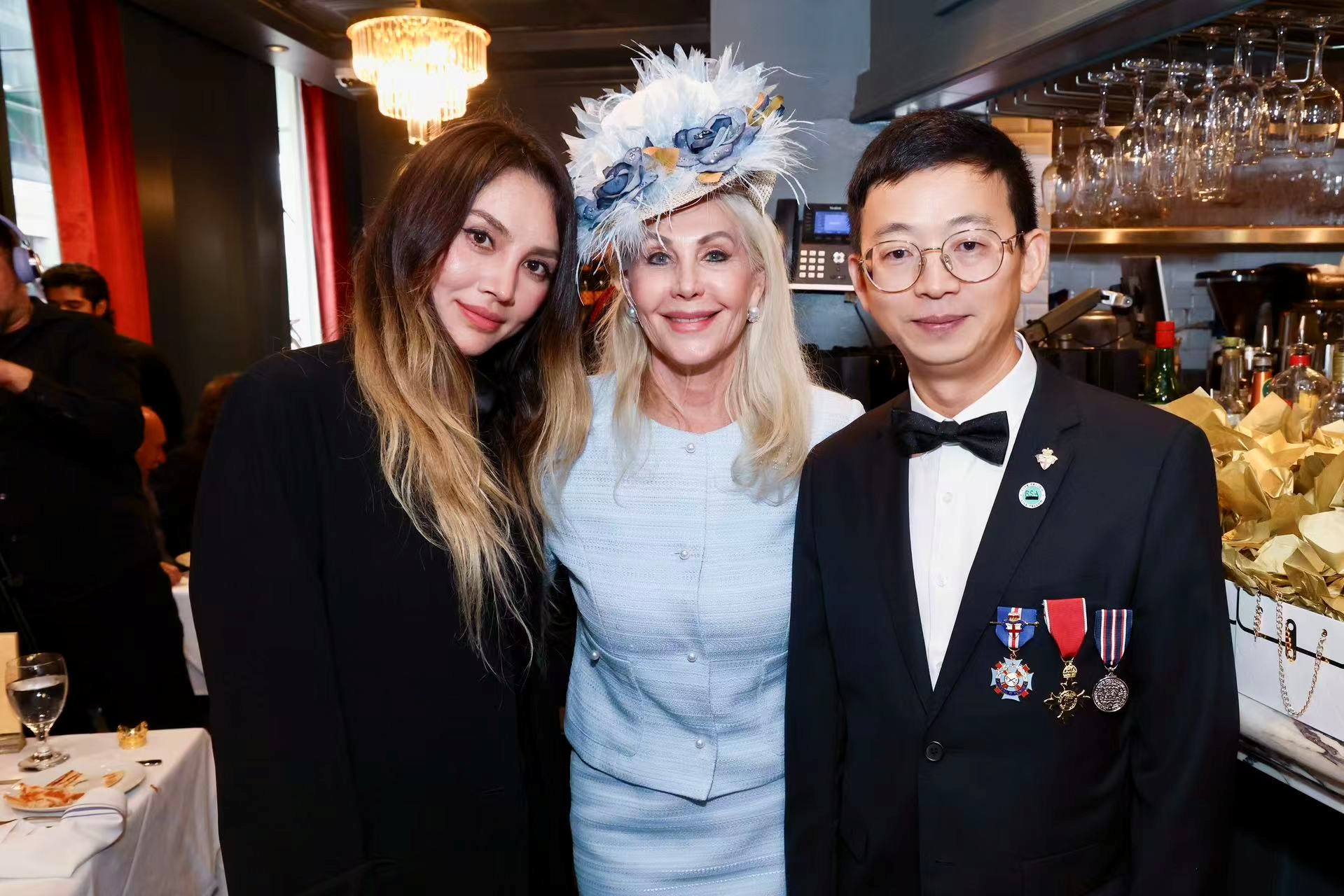 Princess Karen Cantrell presents the prestigious Beneficence Award to Dr. Lingyun Xiang during the ceremony