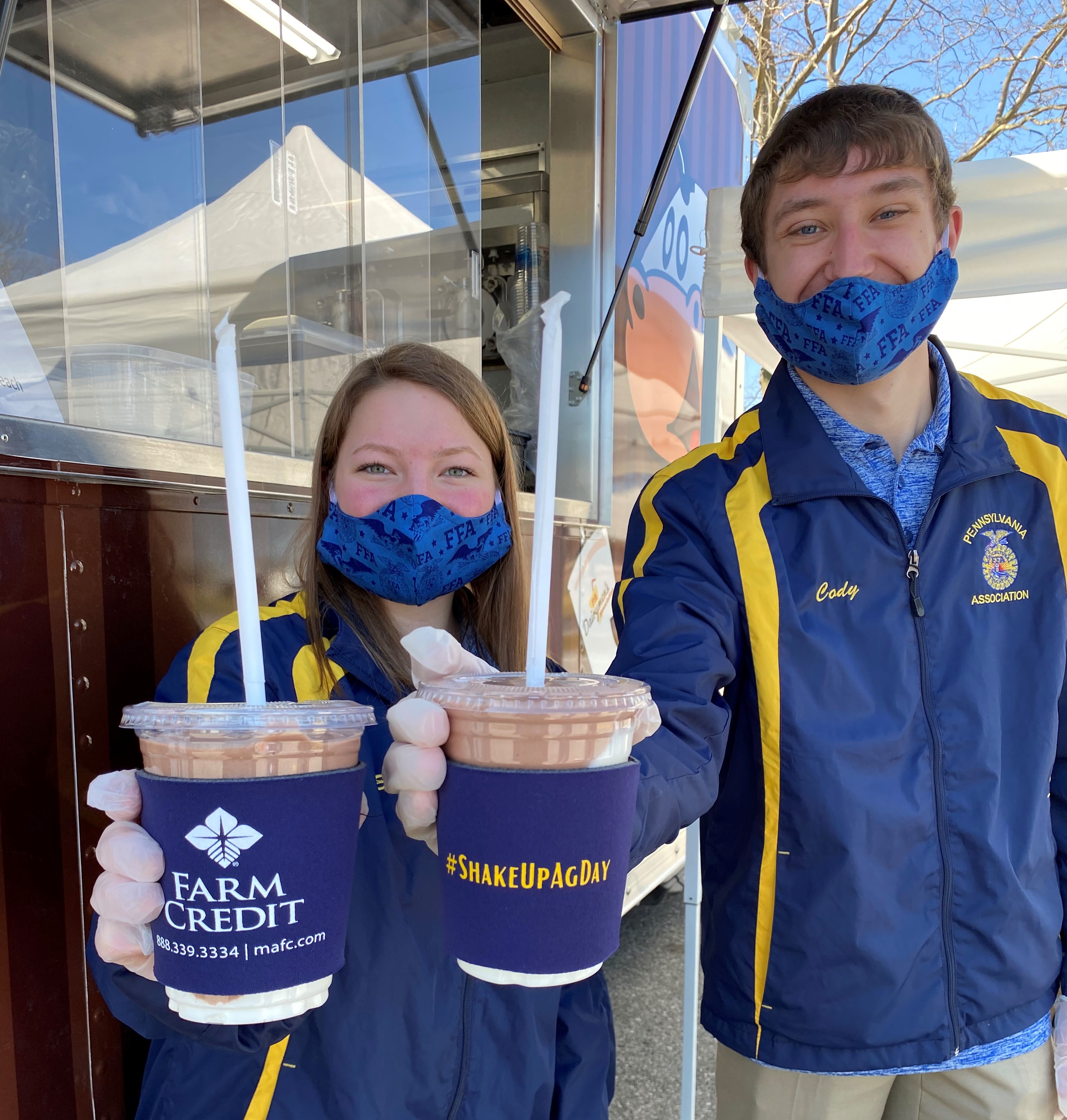 Members of the Pennsylvania FFA Association serving milkshakes.