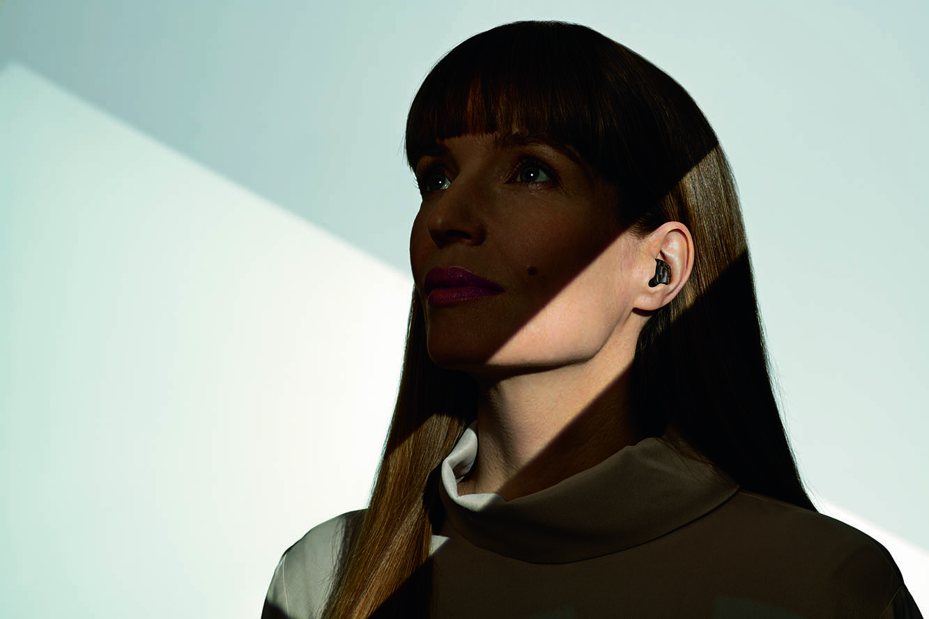 Phonak Virto Black is a premium hearing aid shaped like a hearable.