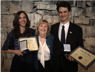 President of the Year, Dr. Michele Haney and two Red Rocks students.

