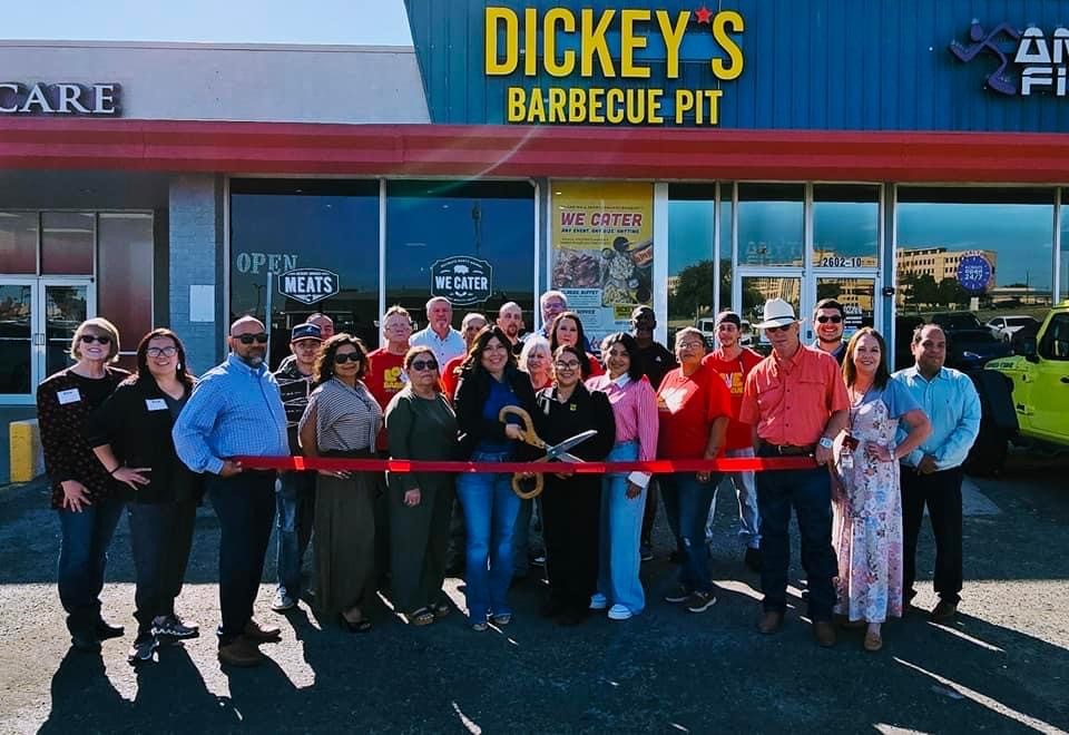 Toni Espinoza and her team celebrate the new location in Big Spring, TX