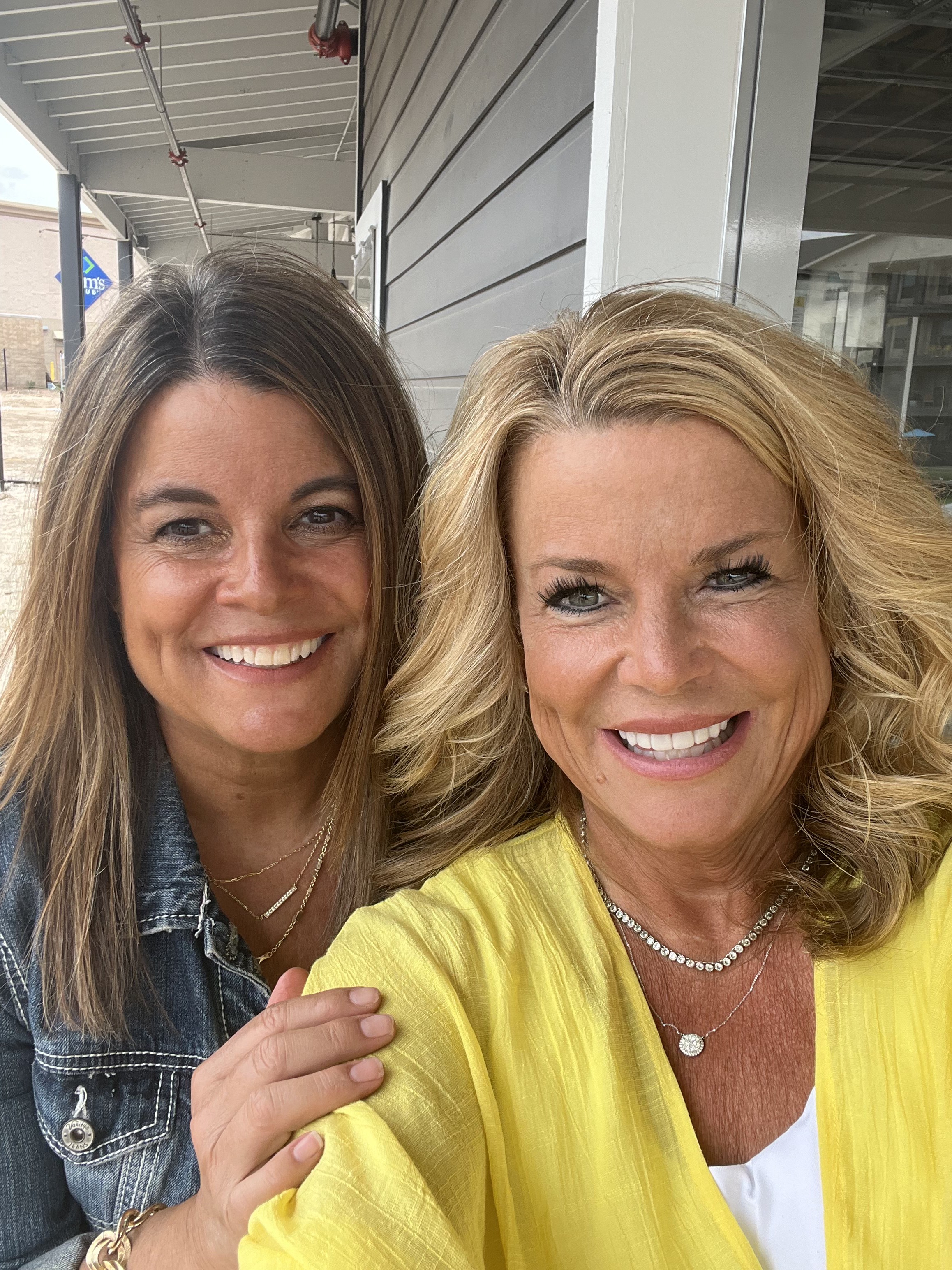 Twin sisters and co-founders Lisa and Laura Ladewig, the owners behind The Tailgate ATX, Austin’s premier dog park and sports bar.