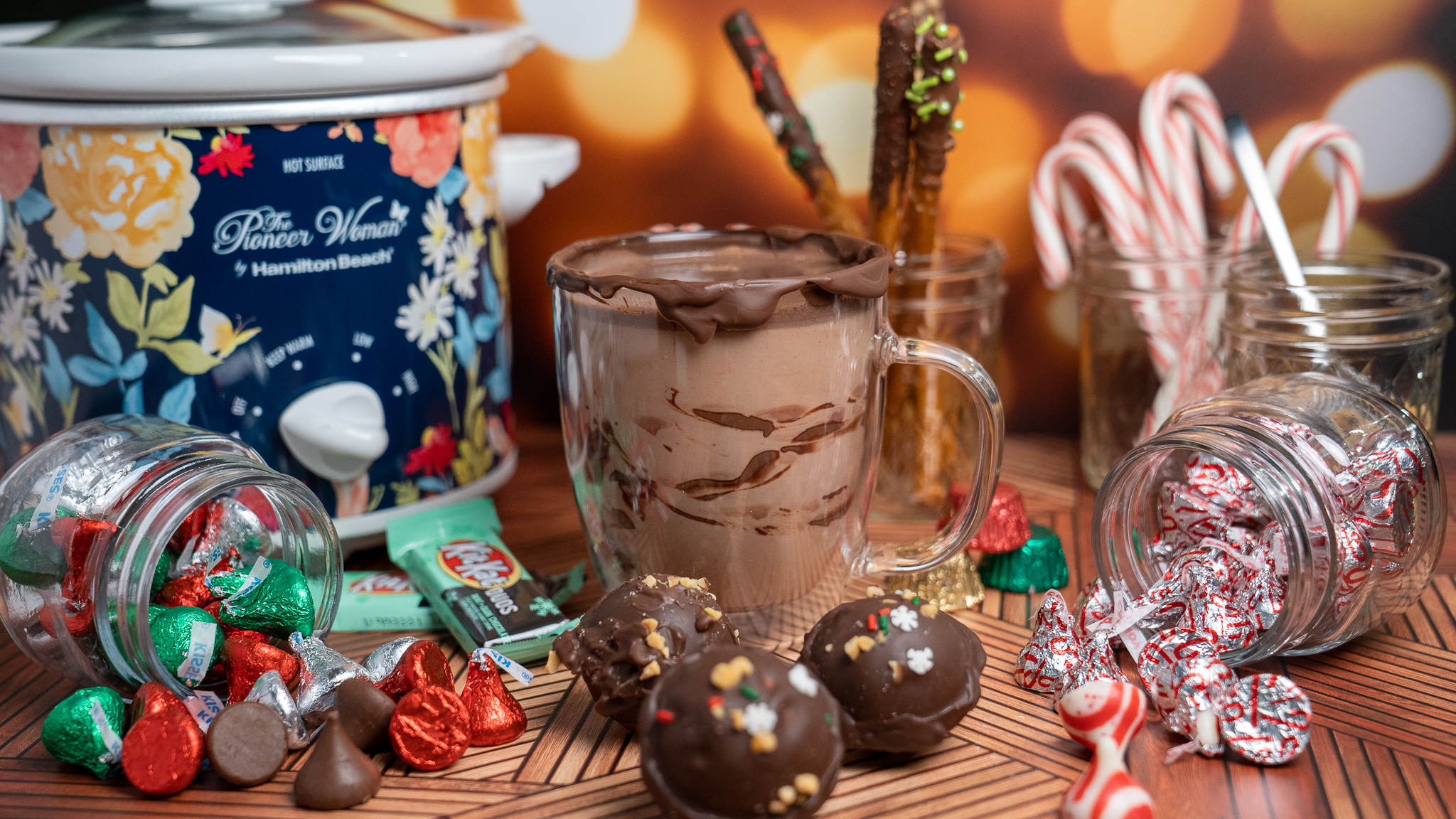Get the recipe for hot cocoa bombs filled with holiday candy in the video description. 