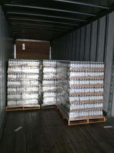 BE WATER Pallets on the Truck
