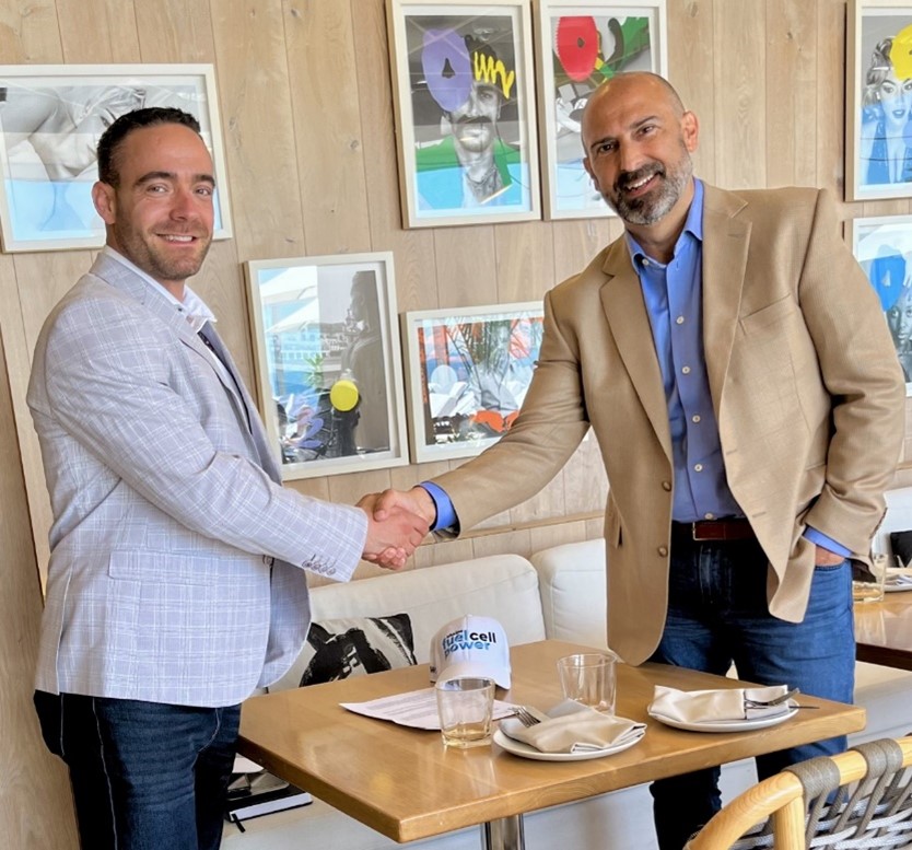 Frank Carnevale, CEO of Alkaline Fuel Cell Power Corp. and Channce Fuller, President and CEO of Progressus shake hands upon finalizing the LOI.