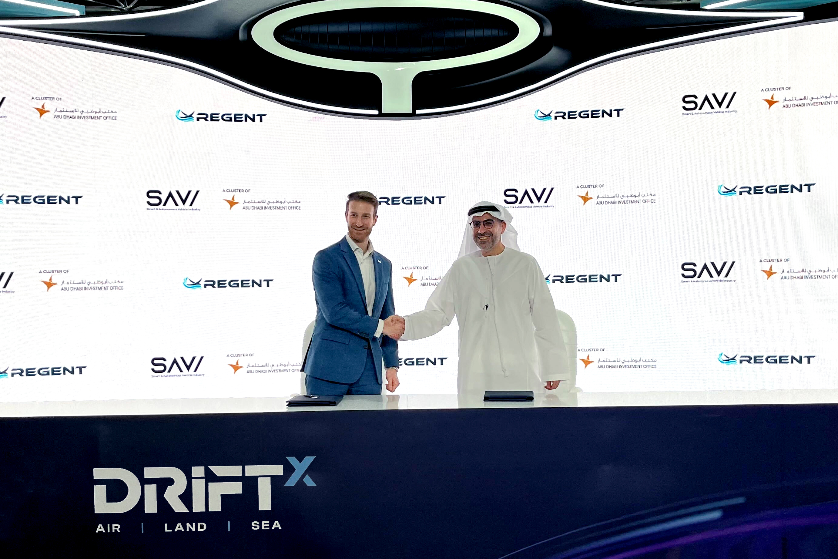 REGENT Co-Founder and CEO Billy Thalheimer (left) signs an MOU with Abu Dhabi Investment Office today at DriftX.