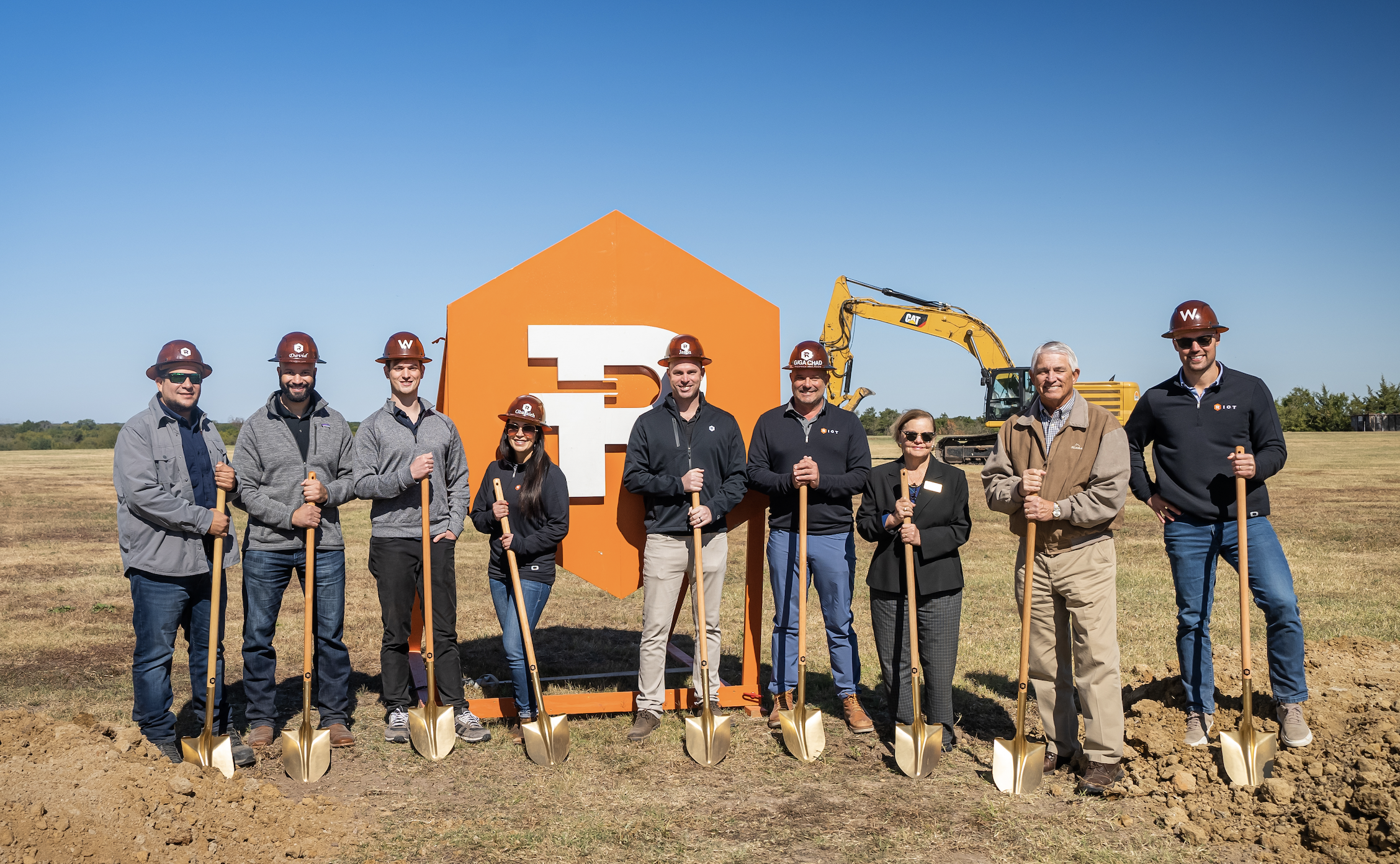 Riot employees gather with Local and state officials to celebrate the Company’s groundbreaking ceremony