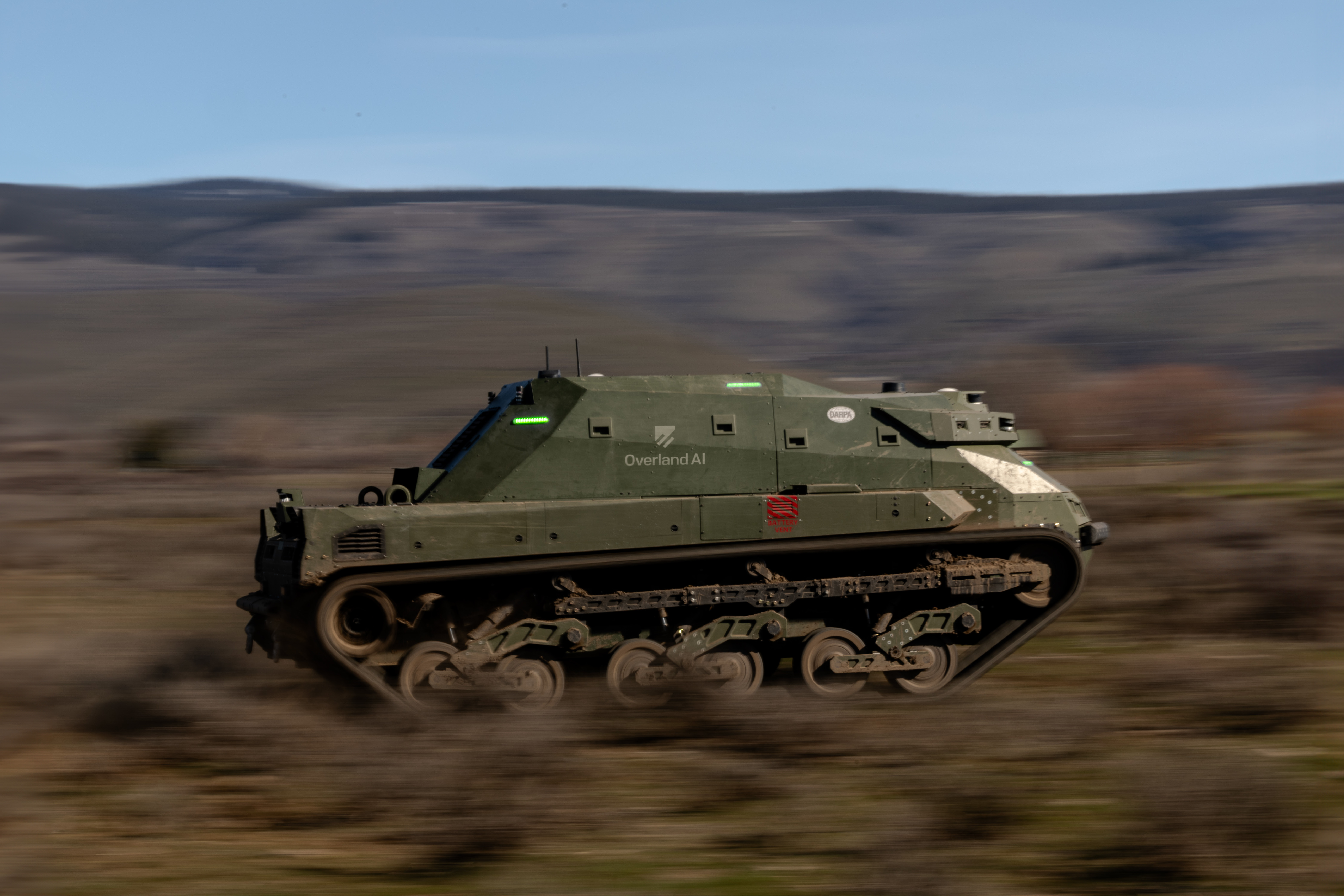 Overland AI's OverDrive autonomy stack is modular, built on open standards, and vehicle agnostic. Overland AI's software is currently installed on a fleet of wheeled side-by-side commercial off-road vehicles and tracked, skid-steered military-style vehicles