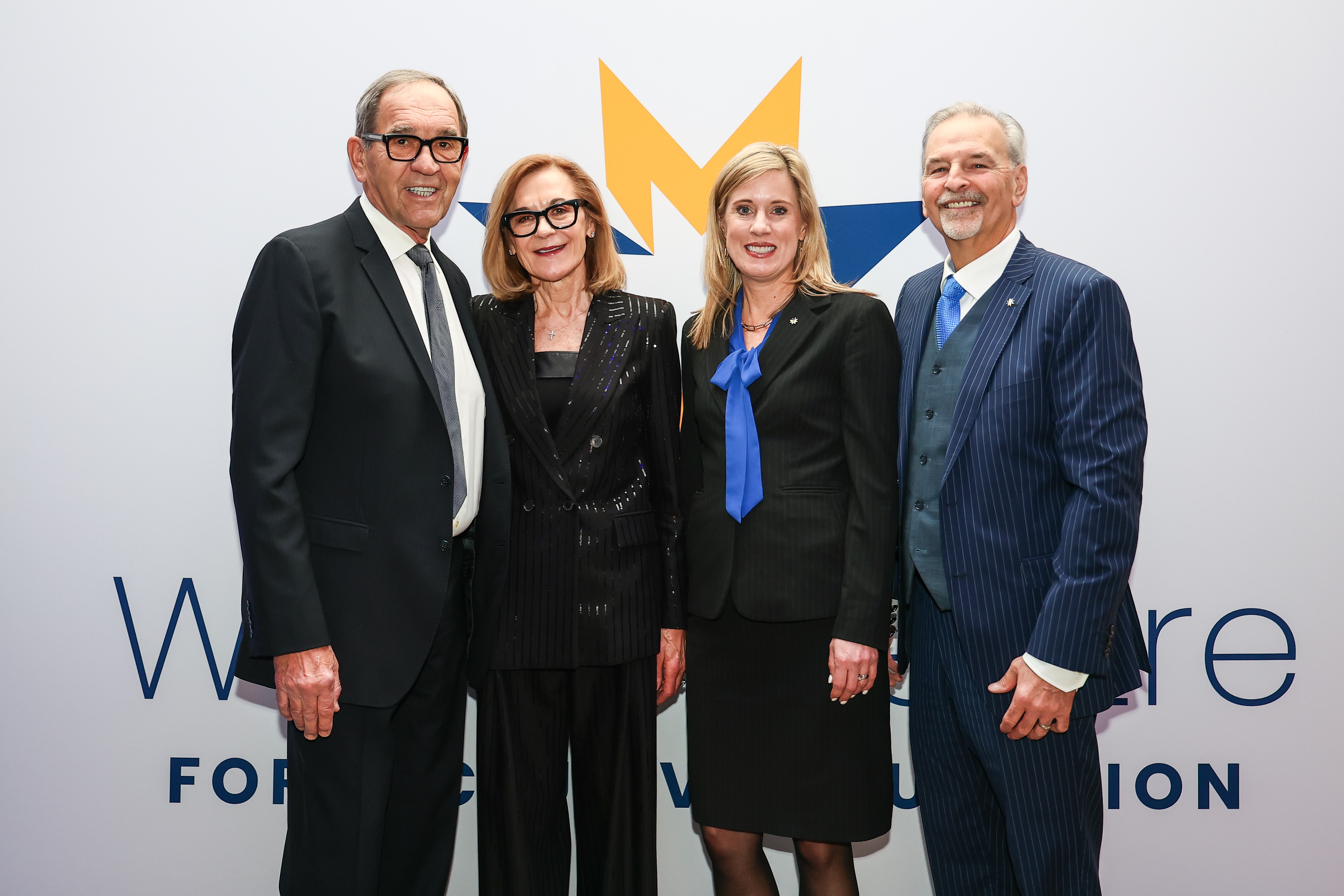 From Left to Right - Clayton Woitas, Linda Woitas, Dr. Sinda Vanderpool, President, St. Mary's University, Gary Strother, Chair, Board of Governors at St. Mary's University, pose for a photograph at the announcement event for the creation of the Woitas Centre for Inclusive Education at St. Mary's University.