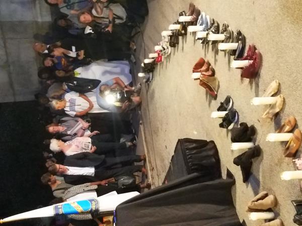 Candles and shoes line Grand Army Plaza in Brooklyn for the prayer vigil mourning mass shooting victims led by UNITED SIKHS & community leaders