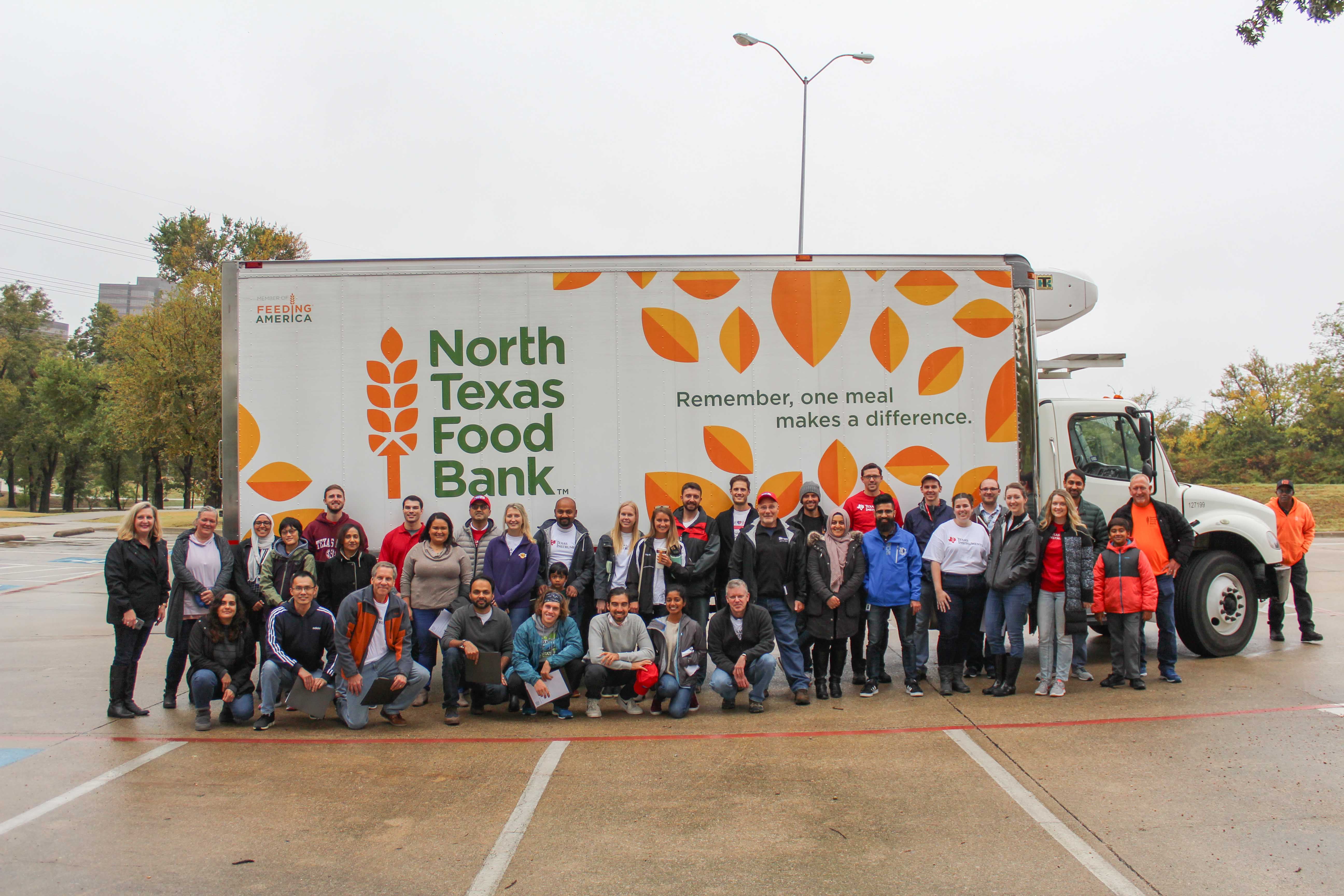 Team members from TI helped the North Texas Food Bank distribute food to the Hamilton Park neigborhood following the devastating tornadoes that occured on October 20. 
