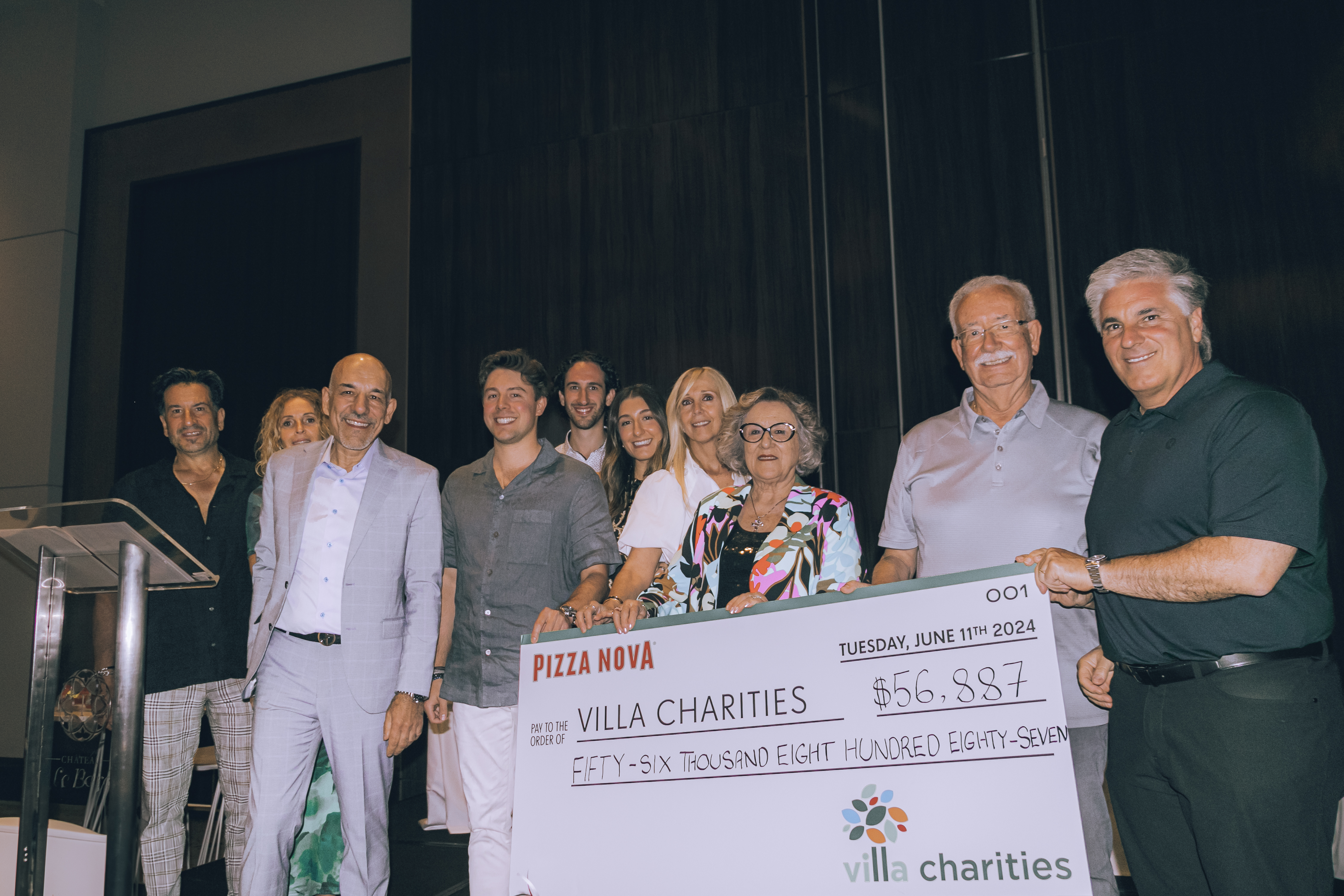 The Primucci Family presents a cheque in the amount of $56,887 to Villa Charities. Marco DeVouno, president and Chief Executive Officer, Villa Charities accepts the donation on June 11, 2024.