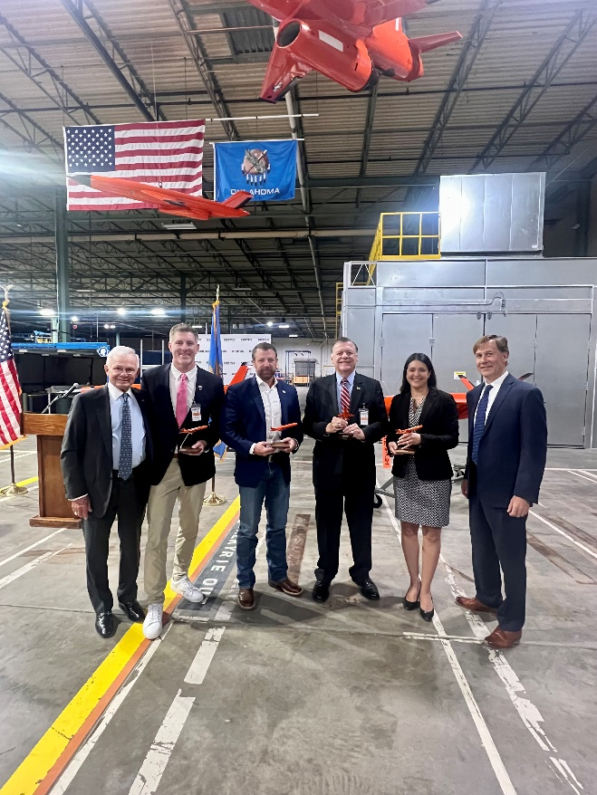 Ben Goodwin of Kratos, Oklahoma Secretary of Military and Veterans Affairs John Nash, Senator Markwayne Mullin (R-OK), Rep. Tom Cole (R-OK-4), Rep. Stephanie Bice (R-OK-5), and Steve Fendley of Kratos Unmanned Systems Division Celebrate 100th Firejet