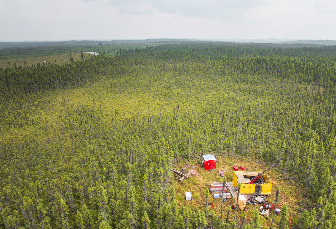 Figure 1: Drill rig with CO1 outcrop in the background