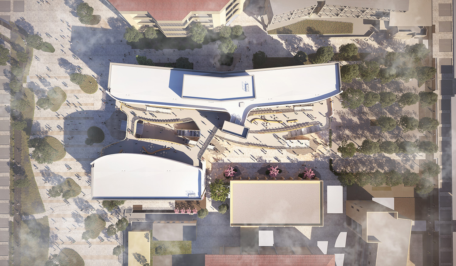 Aerial rendering of the new Classroom Building at the University of California Santa Barbara currently under construction. The project comprises two main volumes surrounding a central circulation corridor that runs east-west, linking the extension of Library Mall to Science Walk. This open-air paseo interconnects the functions of the building, providing outdoor terraces, stairs, bridges, and collaboration spaces designed to encourage serendipitous interactions and collaboration among students and faculty. Image: © LMN Architects.