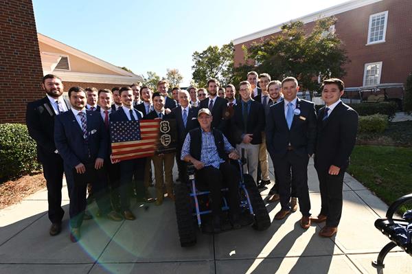 High Point University’s Kappa Alpha Order presented wounded U.S. Army veteran Steve Slate with an all-terrain, tracked wheelchair immediately after today’s Veterans Day Celebration. 