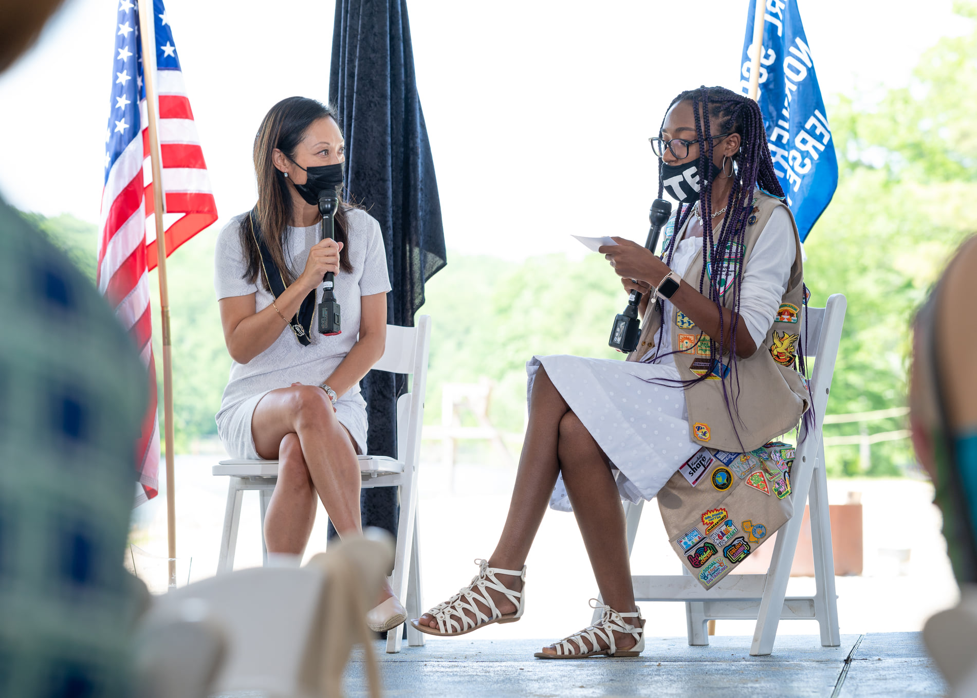 Women of Achievement 2021 honoree Kay Fernandez, Global DX Branding & Senior Vice President, Marketing, Konica Minolta being interviewed on stage by GSNNJ Media Girl Scout, Kathryn Tucker
