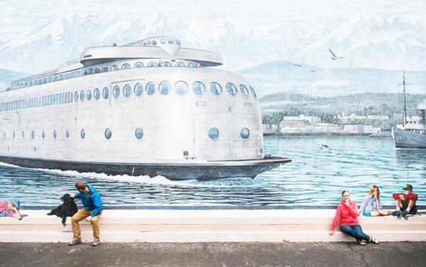 Pose with Kids and the Dog in Front of the MV Kalakala Art Mural Painted By Cory Ench. One of 12 Art Murals on the Mural Trail in Port Angeles, Washington 