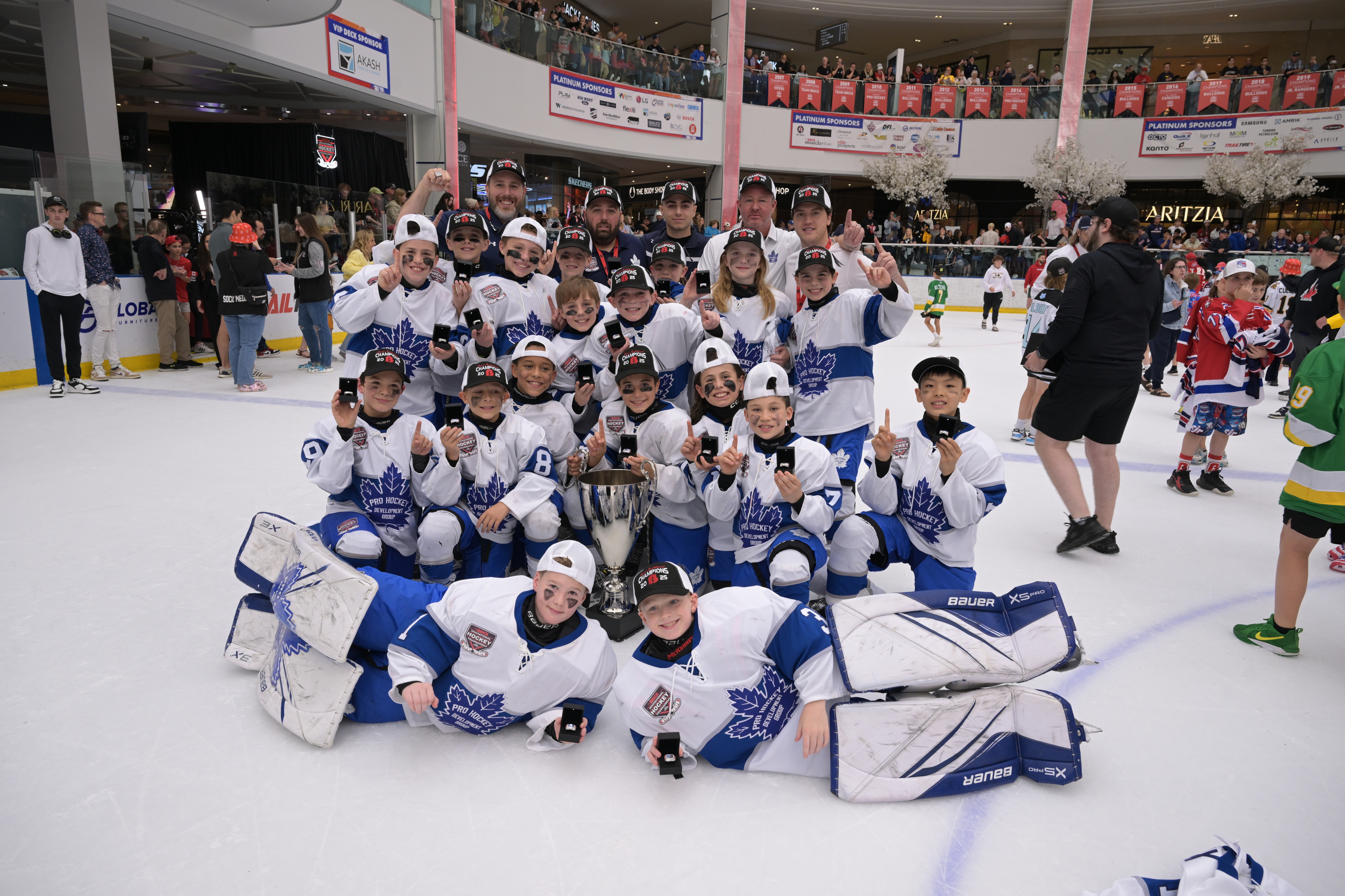 Toronto Pro Hockey celebrate their win at the 36th Annual Brick Invitational Hockey Tournament in Edmonton.