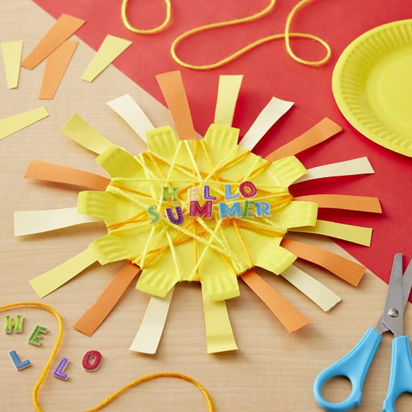 Bright sun-shaped paper craft that says "hello summer" in block letters.