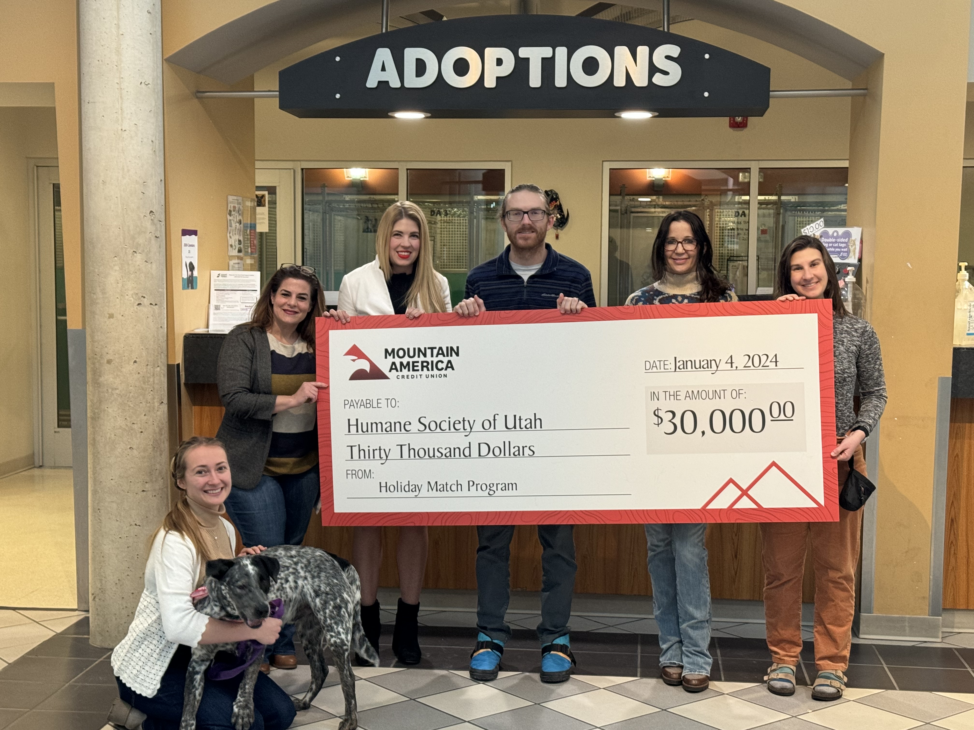 Humane Society of Utah and Mountain America Credit Union: Mountain America Credit Union presenting their holiday match to the Humane Society of Utah. The fundraising effort raised over $300,000 in total.