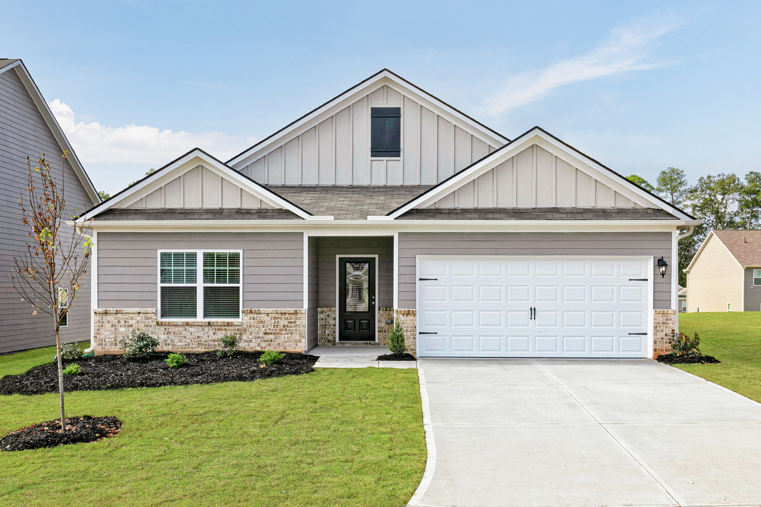 The Burton Plan by LGI Homes at Lake Preserve at Jackson Trail features three bedrooms, two bathrooms, and a spacious family room.