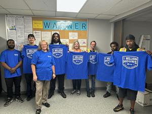 Wagner Logistics staff show off their 1 million hours without a lost time injury celebration T-shirts