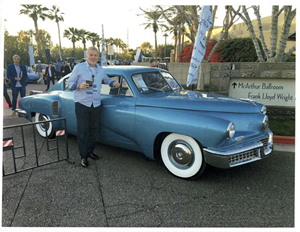 Stephen Tebo poses with the Tucker 48, commonly referred to as the Tucker Torpedo. The vehicle is one of only 47 in existence and on display at Tebo’s