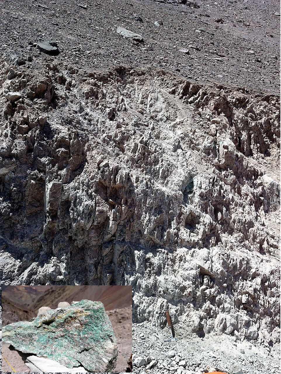 Figure 4: Hidden high angle mineralised structures beneath talus on drill access road.