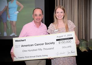 Donation Check for Weichert's 23rd Annual Charity Outing 
