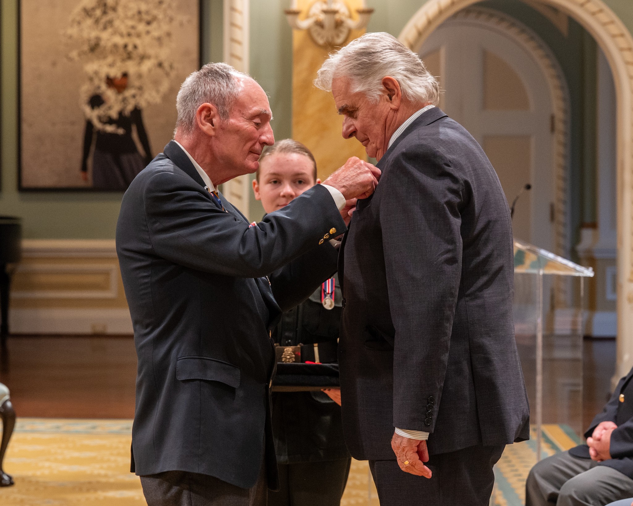 First Poppy 2025_Larry Murray pins on His Excellency