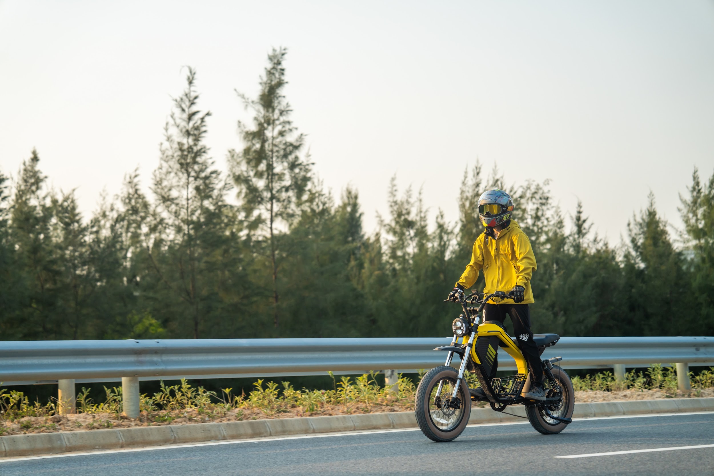 Rider using the Luckeep M5 Max electric moped eBike, showcasing its suspension, braking, and stable urban handling.