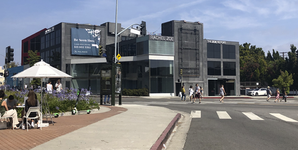 Street view of the 21,379 sq. ft. multi-level, multi-tenant building on the south corner of Melrose Avenue in West Hollywood, CA, purchased by Sterling Organization.