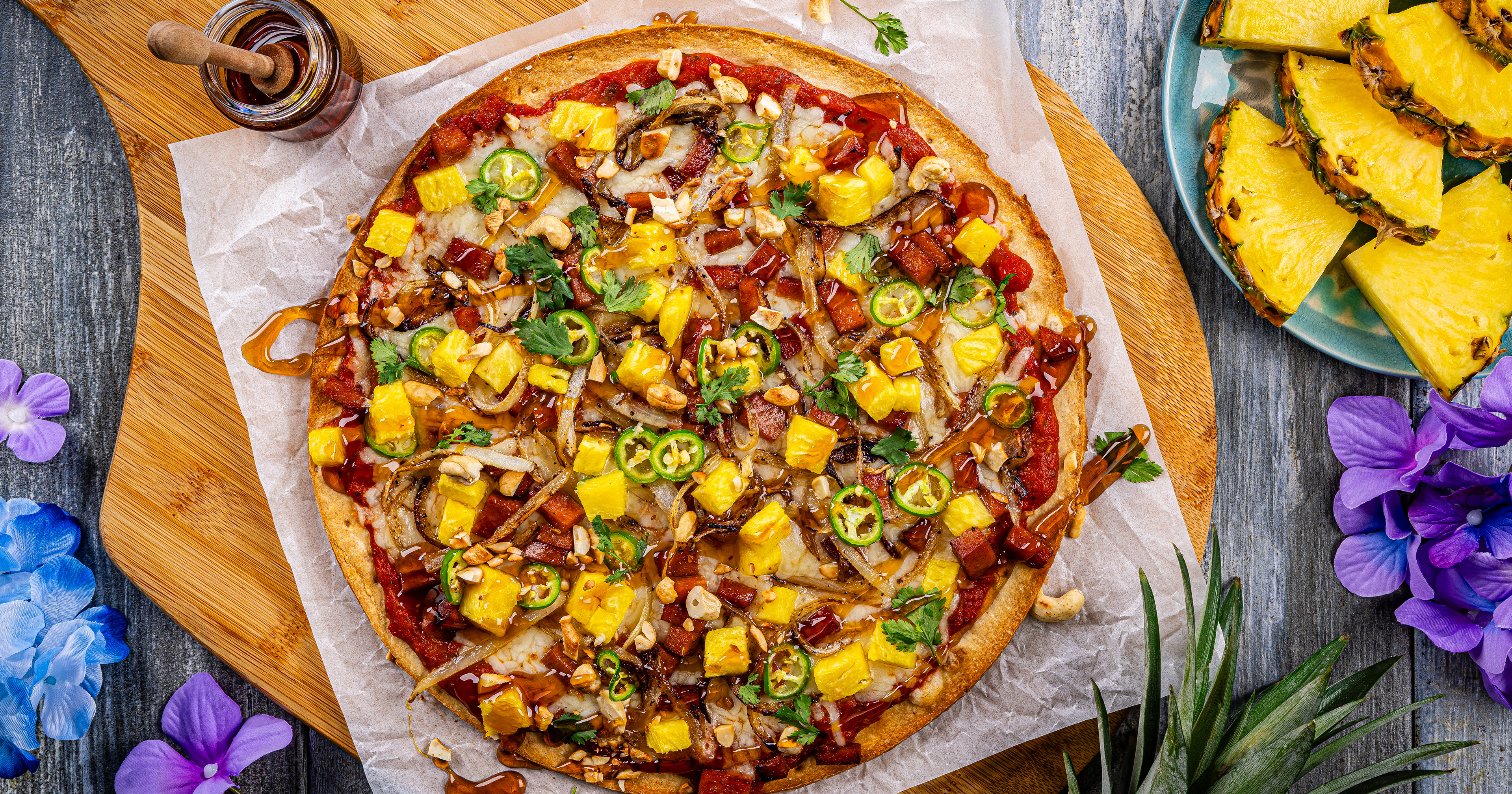 Dole Food Company has released a new Epic Luau Pizza recipe in honor of International Pineapple Day, its 125th Pineapple Anniversary and a newly official position that fresh pineapple does belong on a pizza.