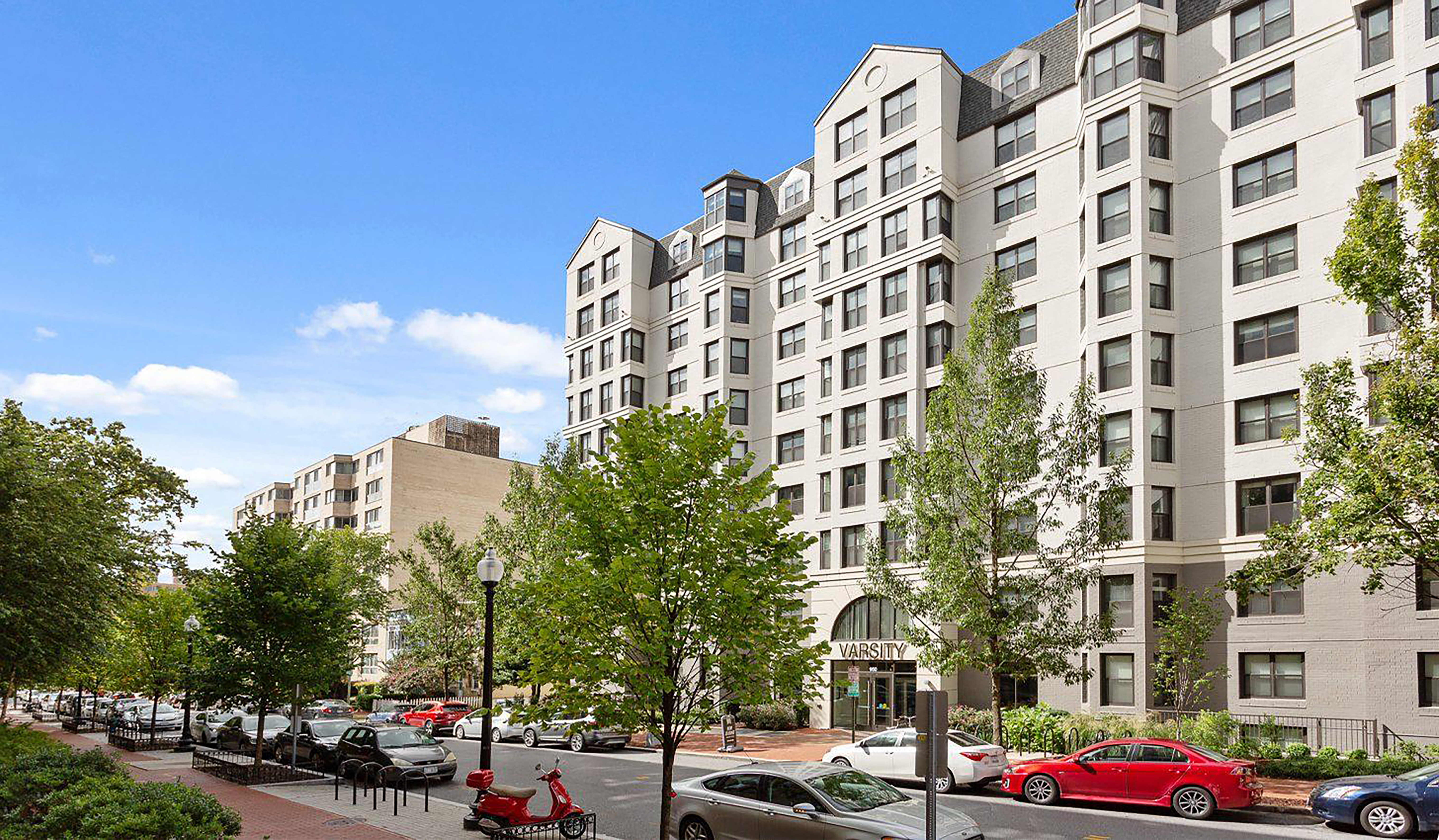 Daytime exterior view of Varsity on K, a multi-story residential building at 950 24th Street NW in Washington, D.C.