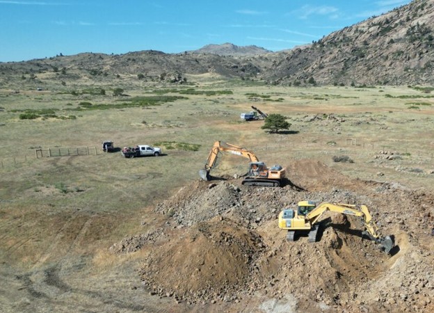 Figure 1 – Aerial view of excavating the blasted, weathered material at the CSM Test Mine image