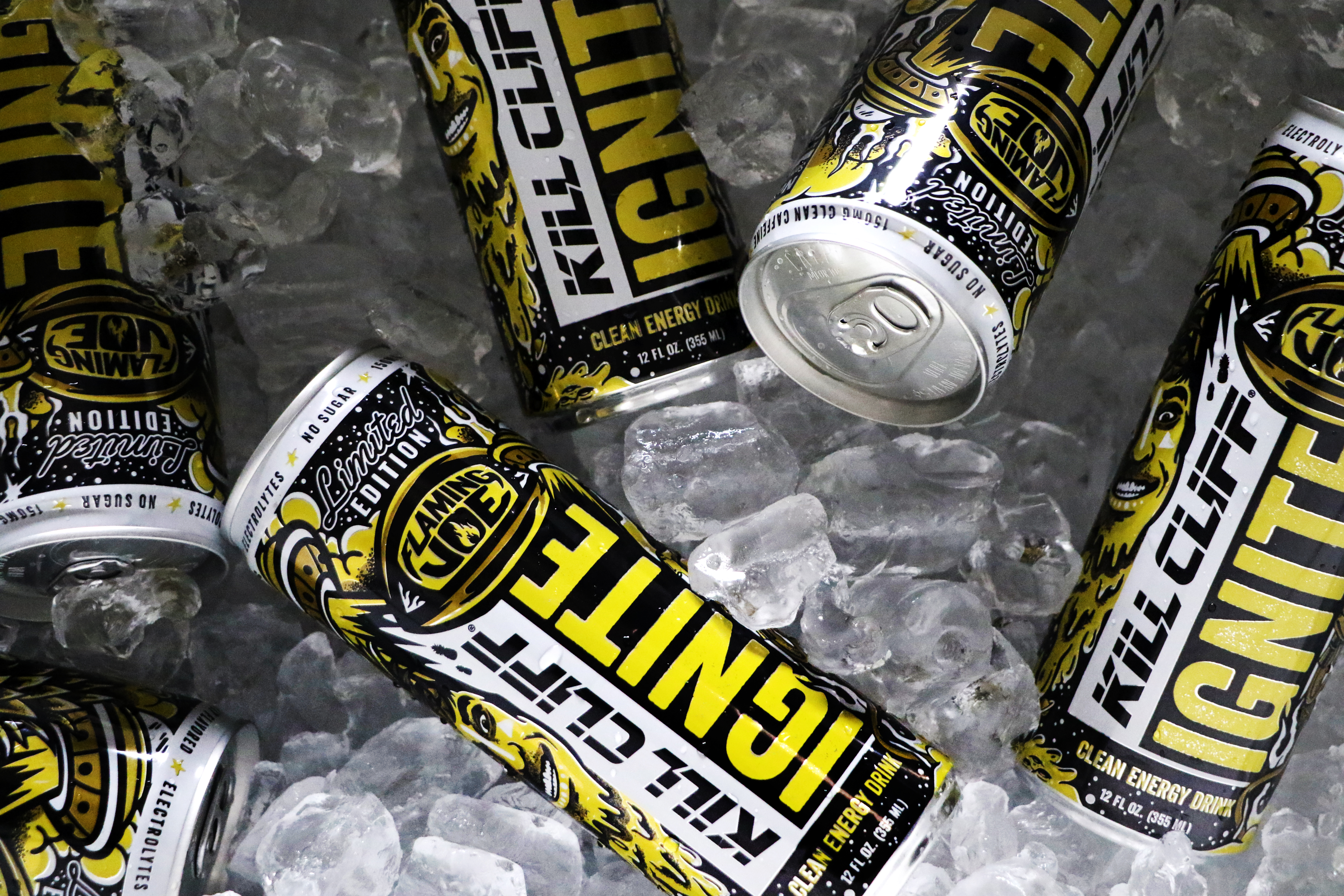 Cans of Kill Cliff energy drink on ice.