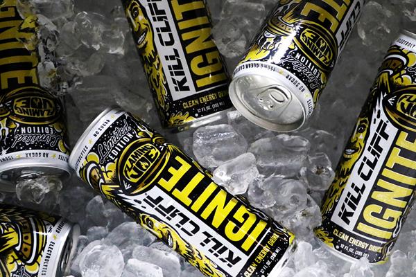 Cans of Kill Cliff energy drink on ice.