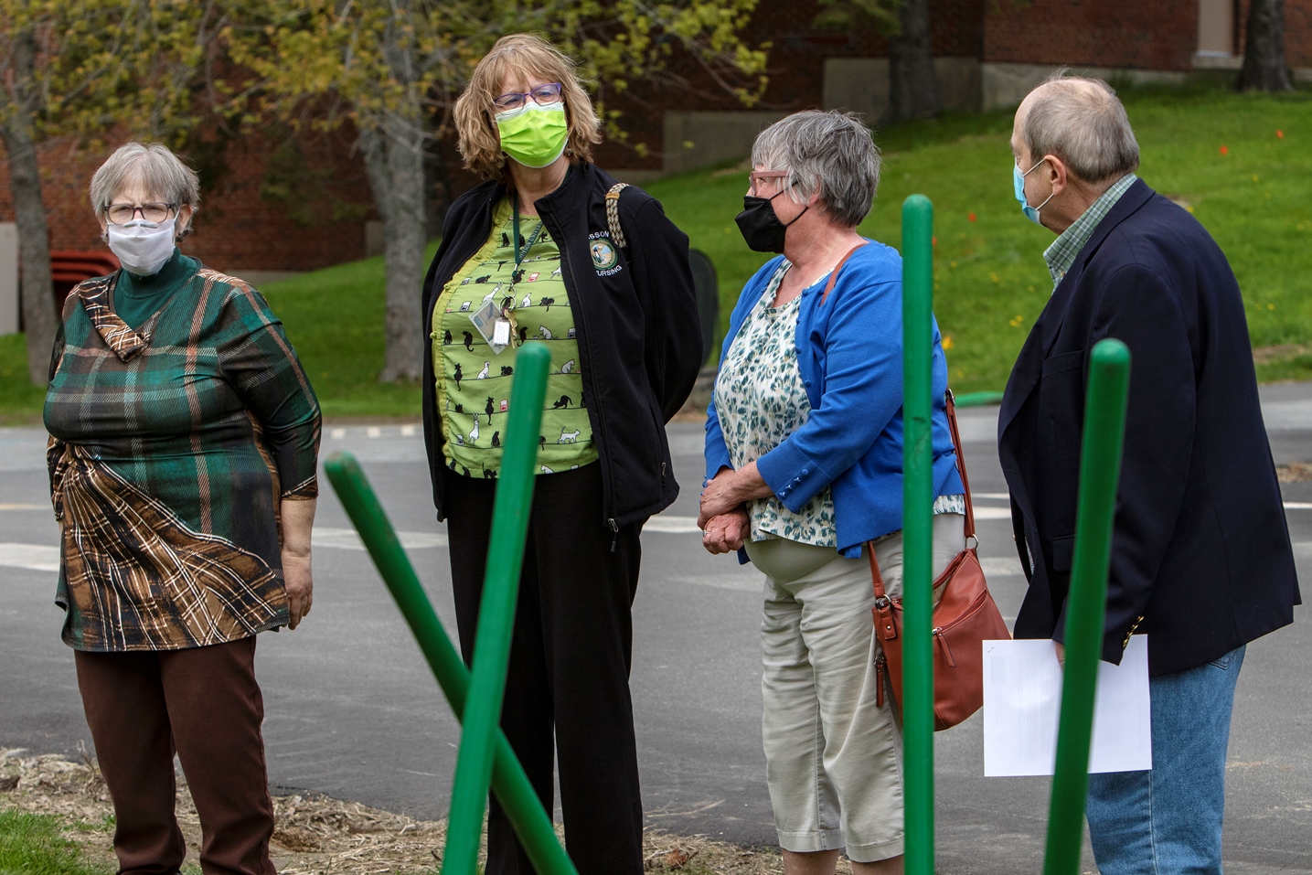 Participating in this year's retiree tree planting ceremony at Husson University were (from left to right) Priscilla Bisher, MS, RN-BC, an instructor in the School of Nursing, Laurie Eddy, MSN, RN, FNP - BC, WHCNP, an assistant professor at the Wellness Center, Janice Clark, an administrative coordinator for Athletics and Robert A. Clark, PhD, CFA, president of Husson University. 