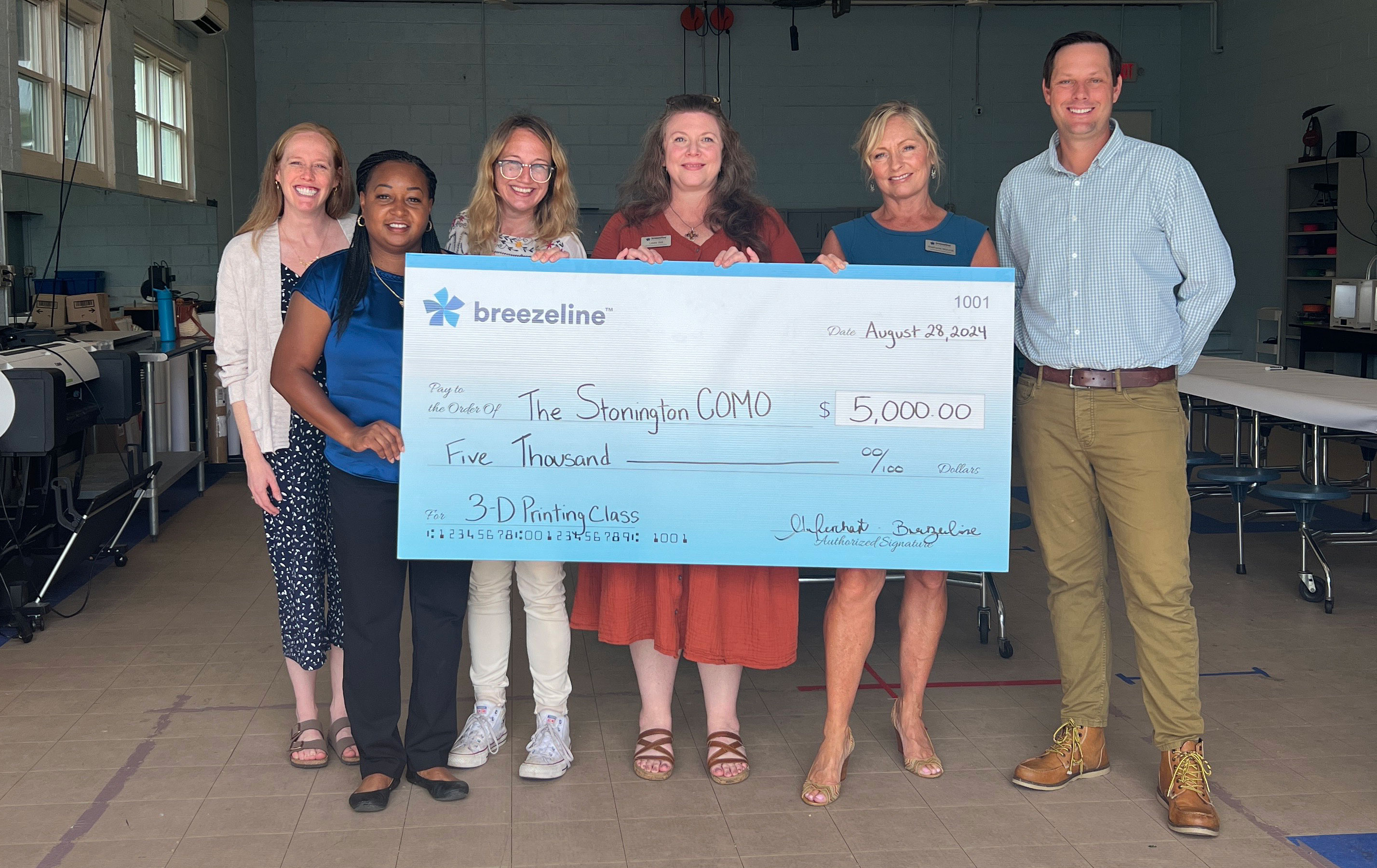 Representatives from Breezeline and COMO at today's donation presentation in Stonington, CT. Pictured from left to right are Katherine Adami (Advancement director, COMO), Natasha Merchant (Marketing Specialist, Breezeline), Victoria Witte (STEAM Director, COMO), Leslie Still (Account Executive, Breezeline), Stephanie Mulvihill (Account Executive. Breezeline), Matthew Haugen (Executive Director, COMO).