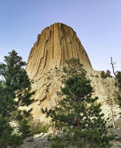 A scenic 3-hour drive from Casper, find Devils Tower, an ancient laccolith that rises high into Wyoming's open sky. 