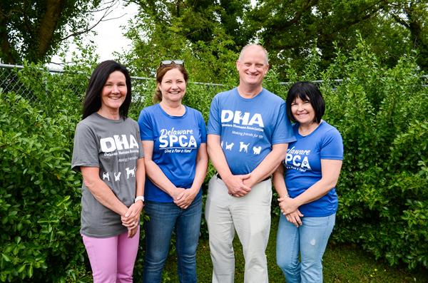 Left to right: Michele Ahwash (DHA Board President), Anne Cavanaugh (Delaware SPCA Executive Director), Patrick J. Carroll (DHA Executive Director), Kim Williams (Delaware SPCA Board President)