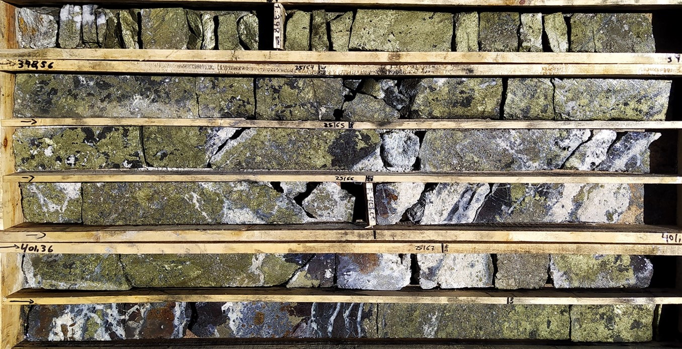 Typical High-Grade Intercept in Hole 39: Tourmaline-altered siltstone clasts set in a chalcopyrite matrix with minor tourmaline and pyrite. SFDH-039, 395.0 to 404.19 m; From a 72m interval that averaged 3.47% Cu, 0.71 g/t Au & 100 g/t Ag. Photograph is of a selected interval and is not necessarily representative of mineralisation hosted throughout the property.