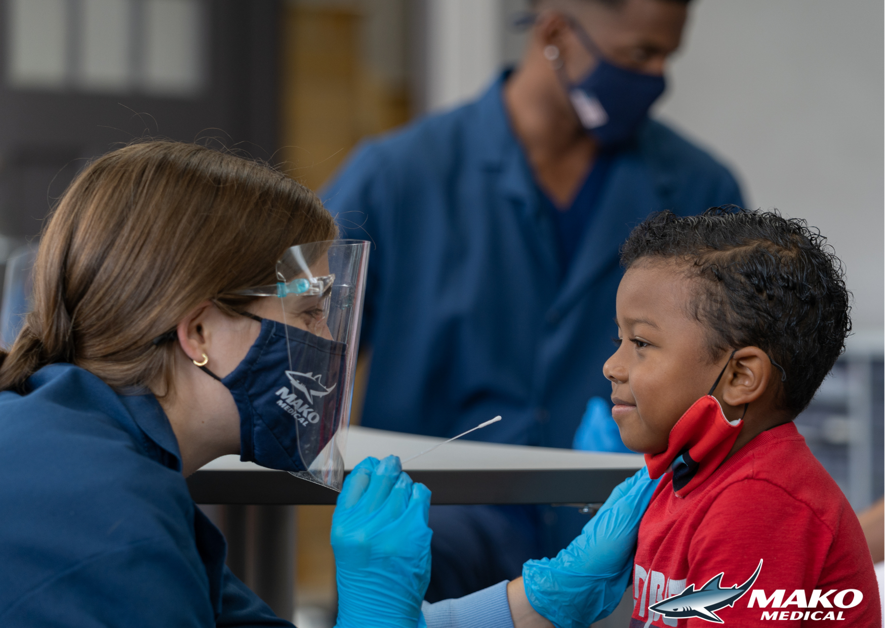 July 2021, MAKO Medical team members conducting COVID-19 K-12 tests.