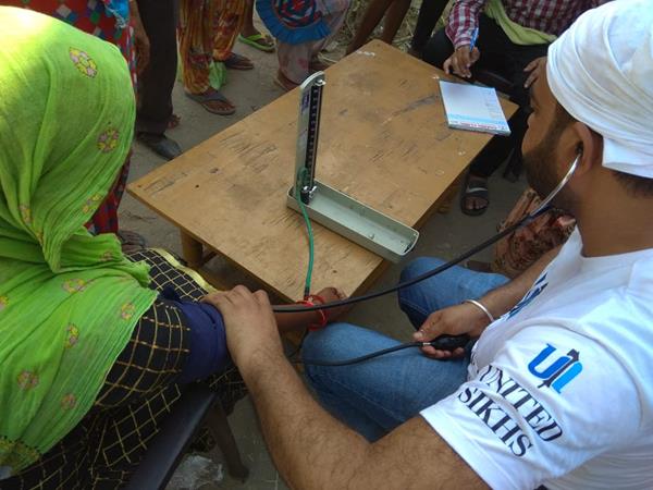 UNITED SIKHS Mobile Medical Camps Provide Health Screenings to Flood Survivors