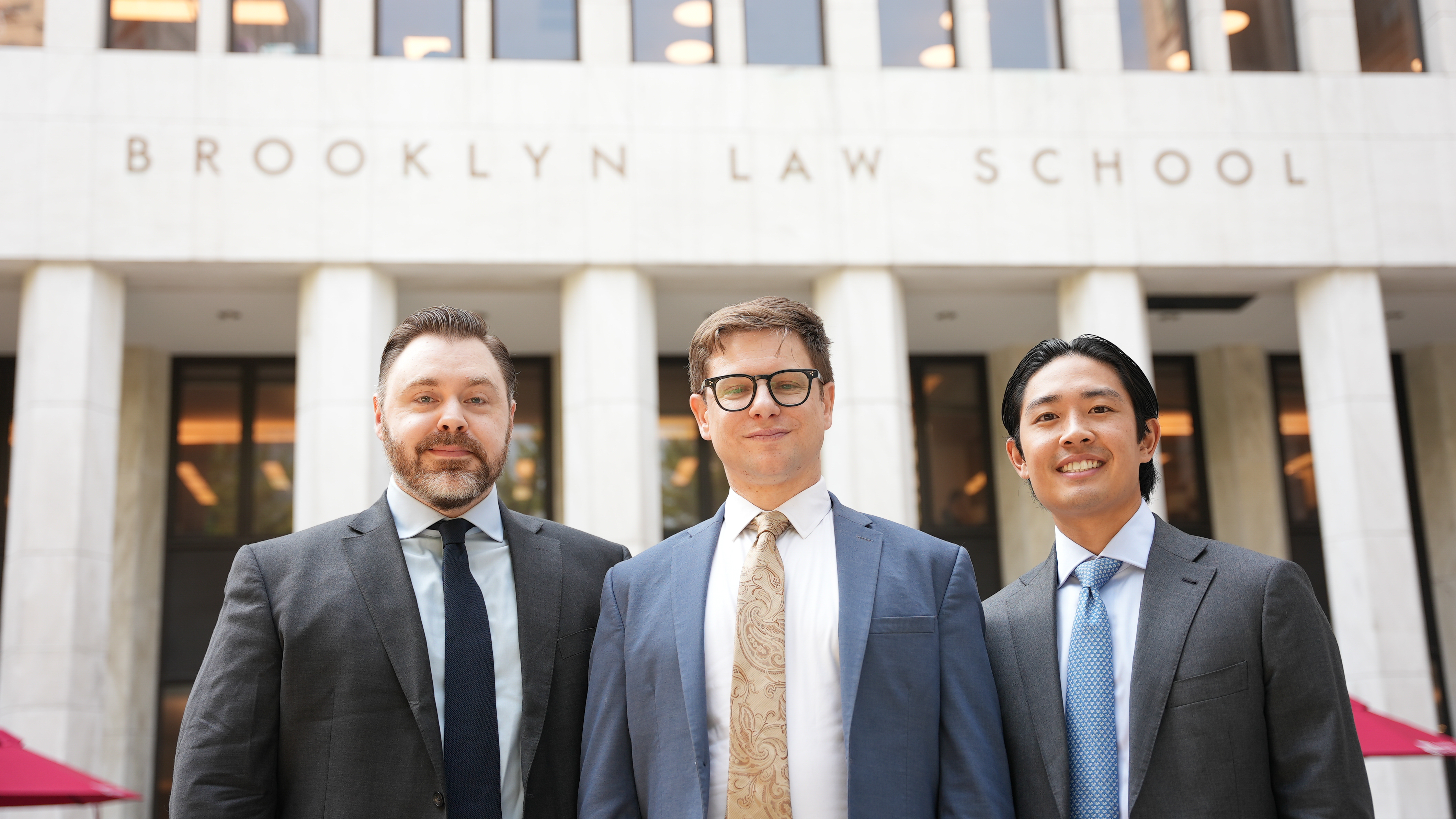 U.S. military veterans now attending Brooklyn Law School (from left) Sean M. Godfrey ’26, Phillip Rudy ’25, and Willis Huynh ’26 helped re-establish the school’s Veteran Students Association.