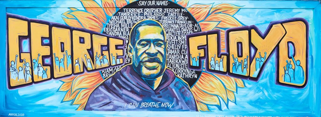 Mural of George Floyd located on Chicago Avenue in Minneapolis, Minnesota.  Art by Xena Goldman, Greta McLain, and Cadex Herrera