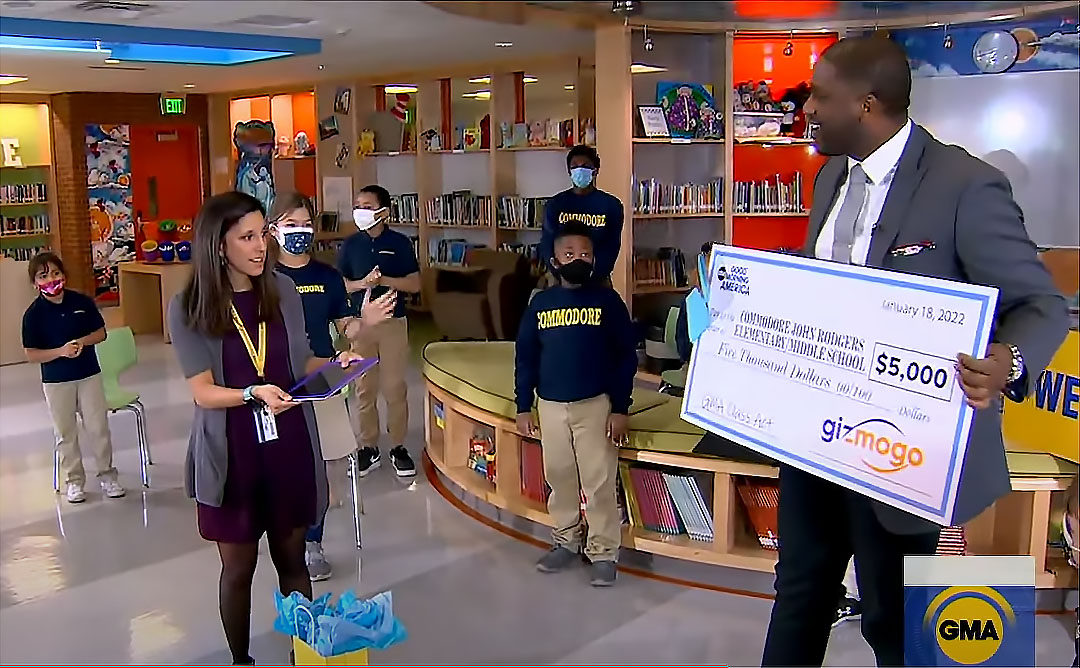 Teacher Robin Palomeres receives generous Gizmogo school donation