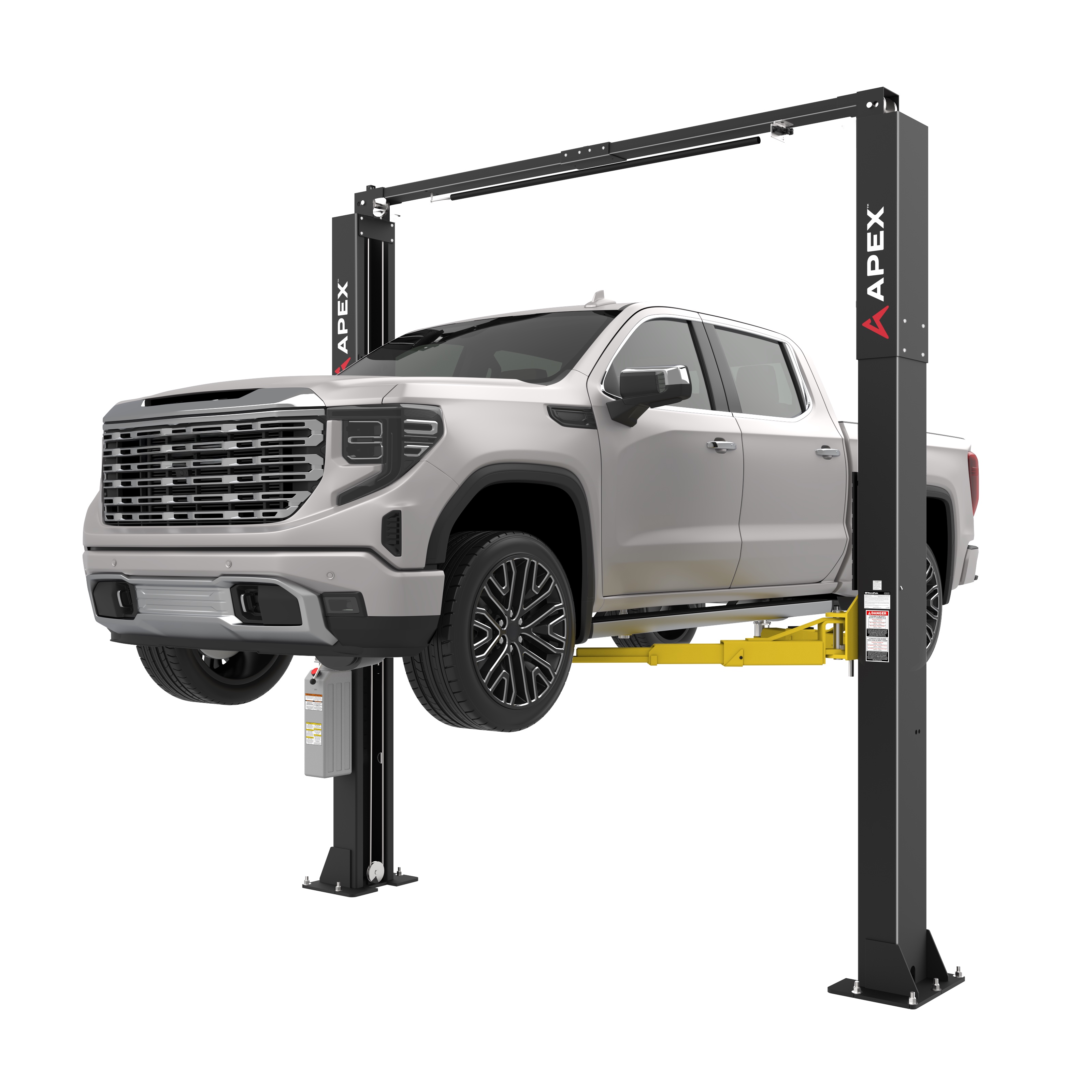 An APEX clearfloor two-post lift holding a crew cab pickup truck