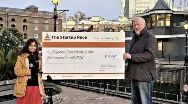 Priyansu Nath, founder and CEO of House of Tula, wins the £10,000 Startup Race cash prize. Nath stands with James Shoemark, co-founder of The Startup Race.